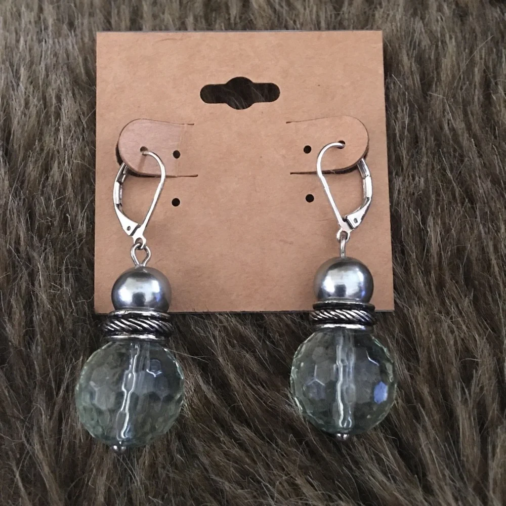 Faceted light blue glass silver tone lever backs